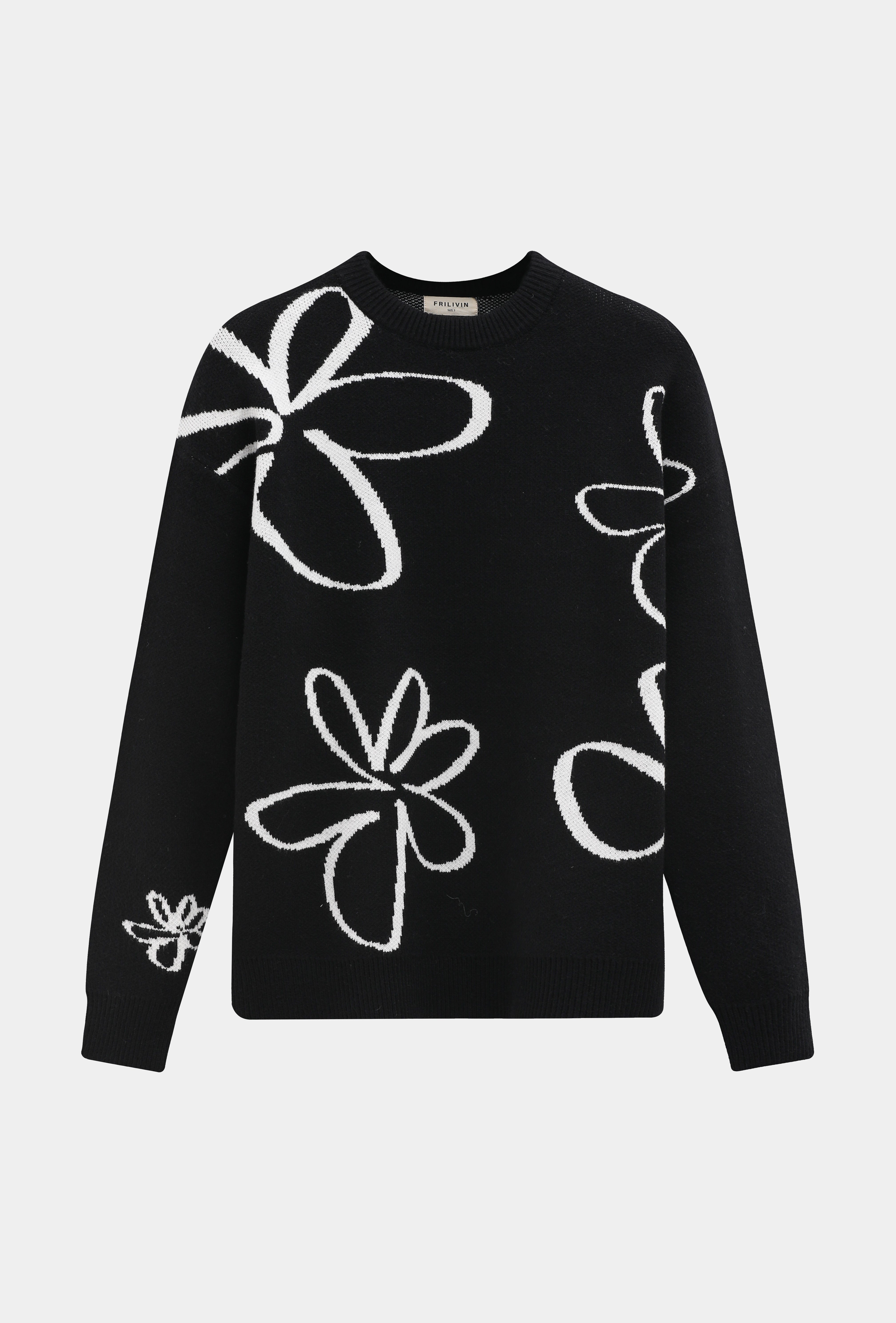 Pull noir motifs fleur