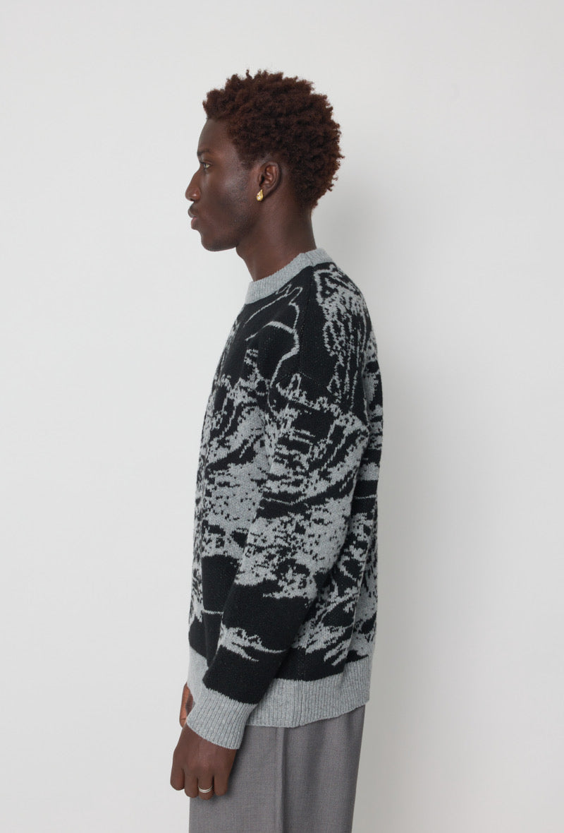 Pull noir motifs gris